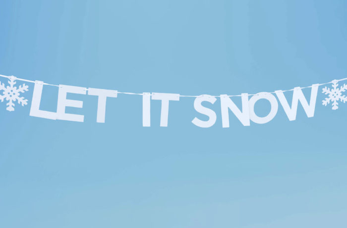 banner with snowflakes that reads "Let It Snow"